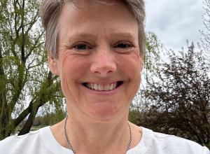 Outdoor head photo of Tory B smiling